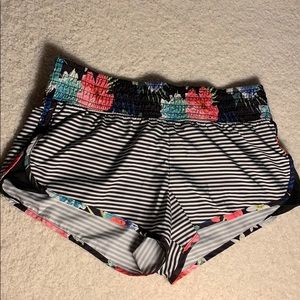 Tropical print, striped, athletic shorts